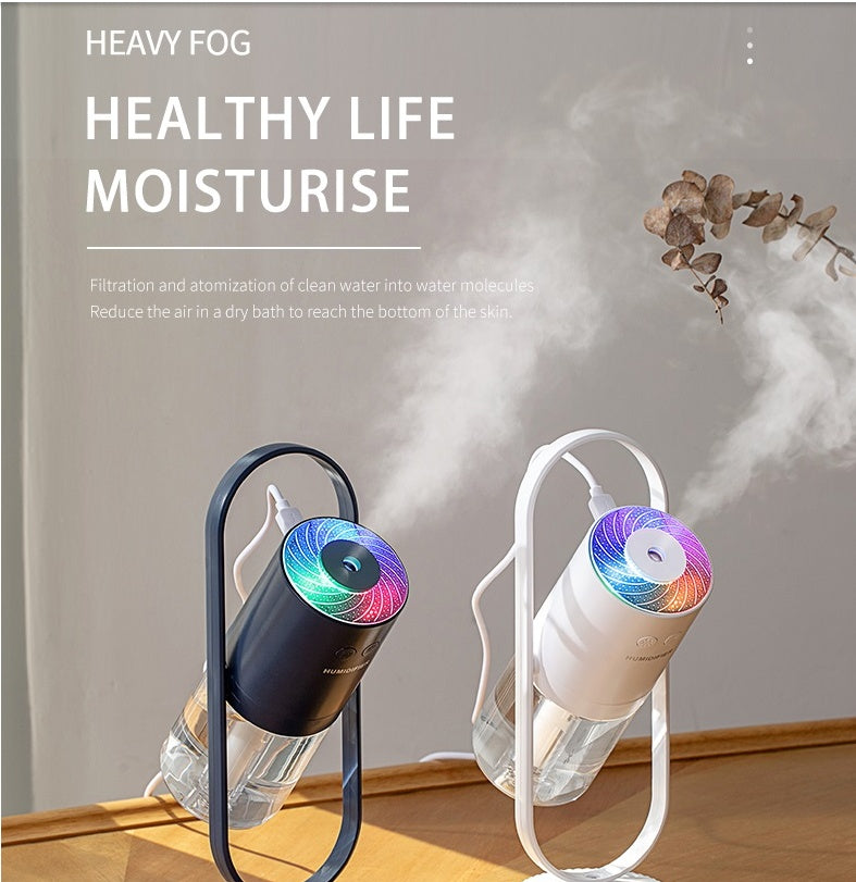 USB air humidifier with projection night light in pink and blue colors for home and car use