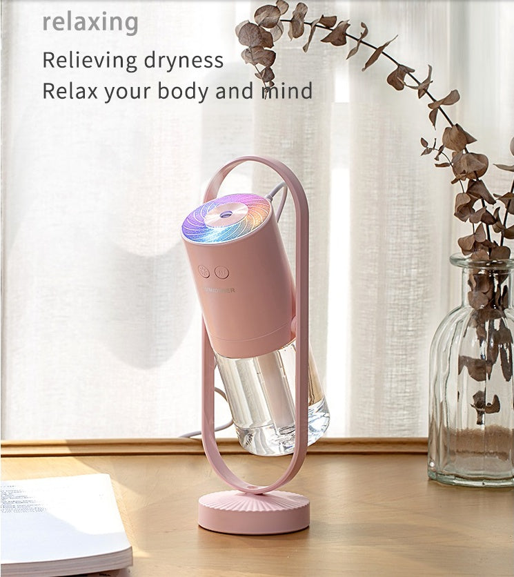 Magic Shadow USB air humidifier with projection night lights in pink and blue colors for home and office use