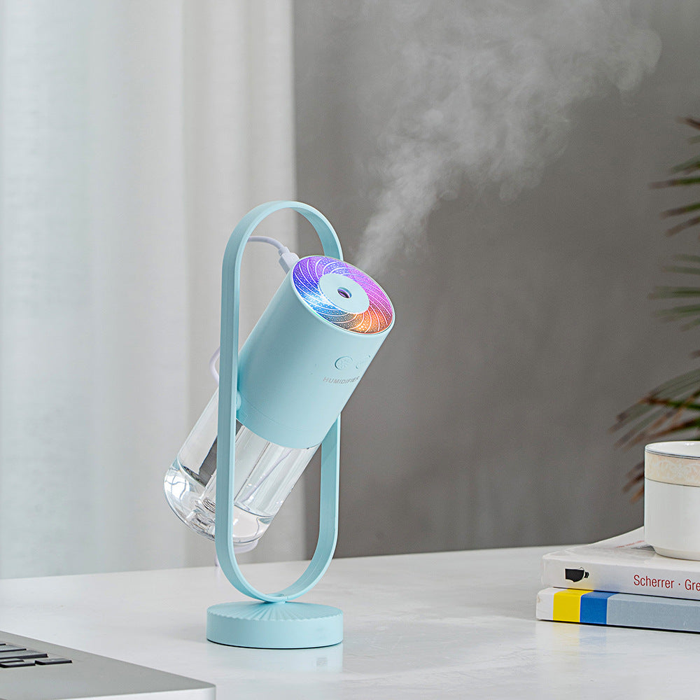 Magic Shadow USB air humidifier with projection night lights in pink color, compact ultrasonic car mist maker for home and office use