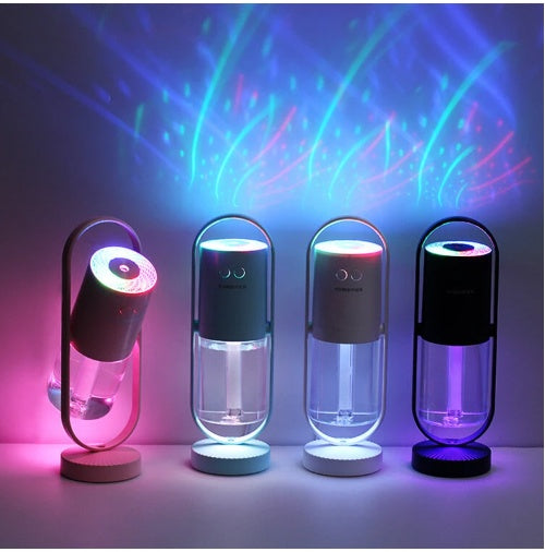 Magic Shadow USB Air Humidifier with projection night lights on wooden table