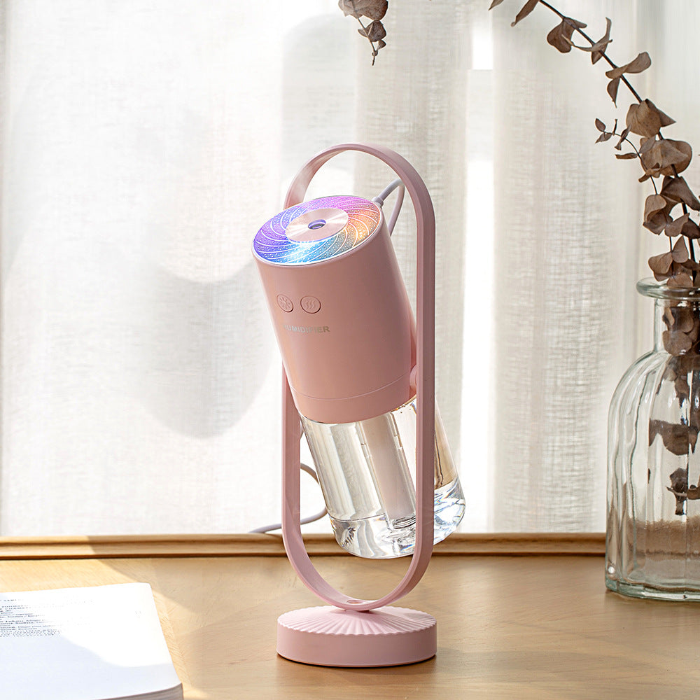 Magic Shadow USB Air Humidifier with projection night lights emitting mist in a home setting