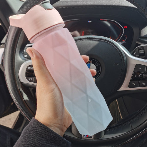 Pink spray water bottle for girls with handle strap and leakproof lid for outdoor sport and fitness