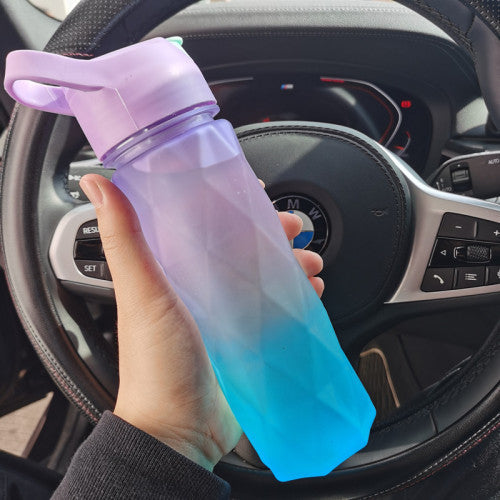 White and pink spray water bottle for girls with handle strap and leakproof lid for sports and outdoor use
